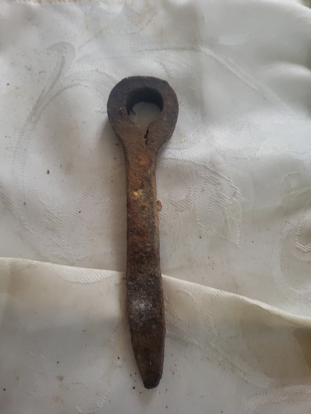 early century cast iron spike used for securing shutter , barn doors and such